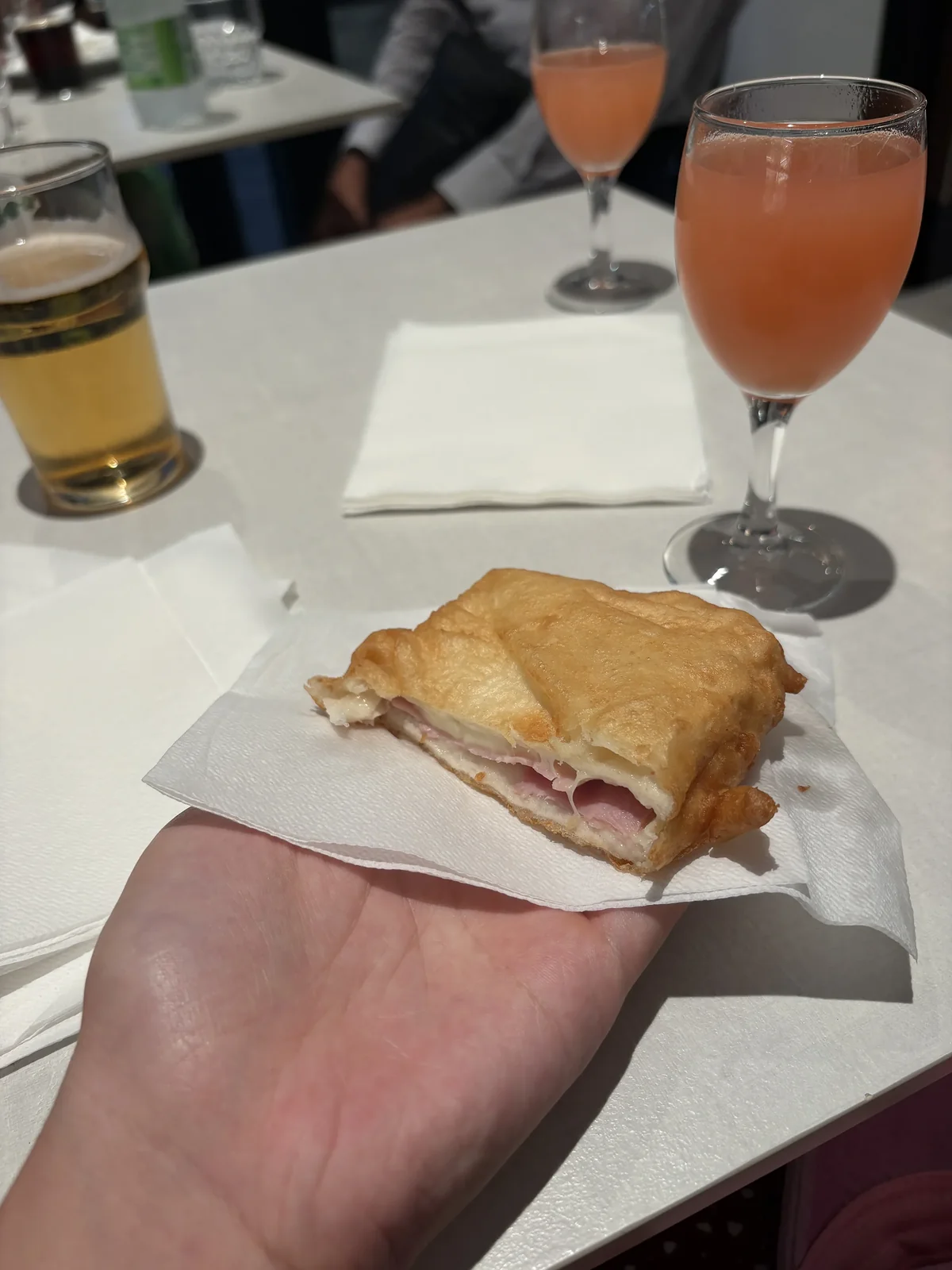 fried dough stuffed with ham and cheese
